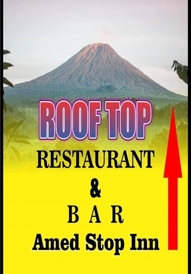 Amed Stop Inn Homestay, Rooftop Restaurant And Bar Екстериор снимка