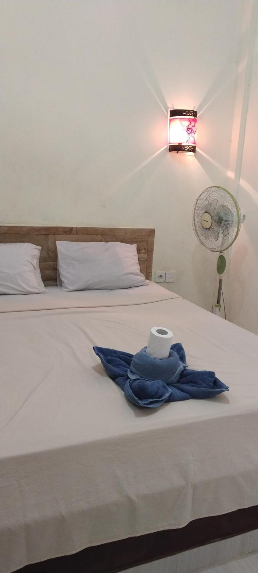 Amed Stop Inn Homestay, Rooftop Restaurant And Bar Екстериор снимка