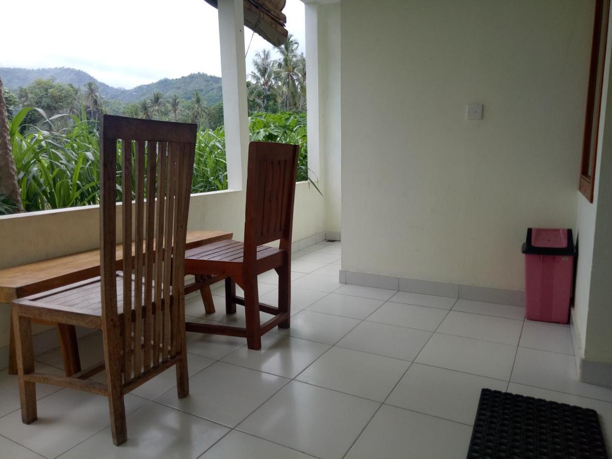 Amed Stop Inn Homestay, Rooftop Restaurant And Bar Екстериор снимка