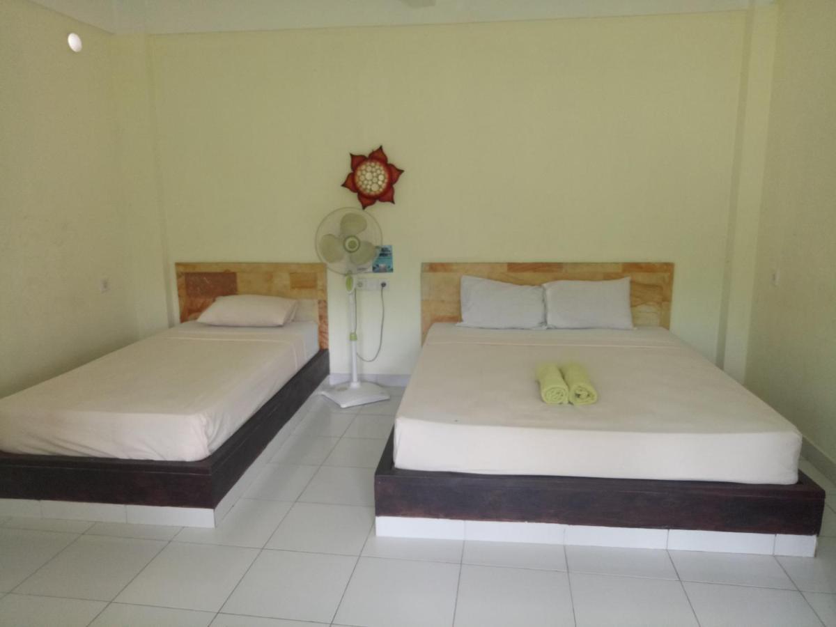 Amed Stop Inn Homestay, Rooftop Restaurant And Bar Екстериор снимка