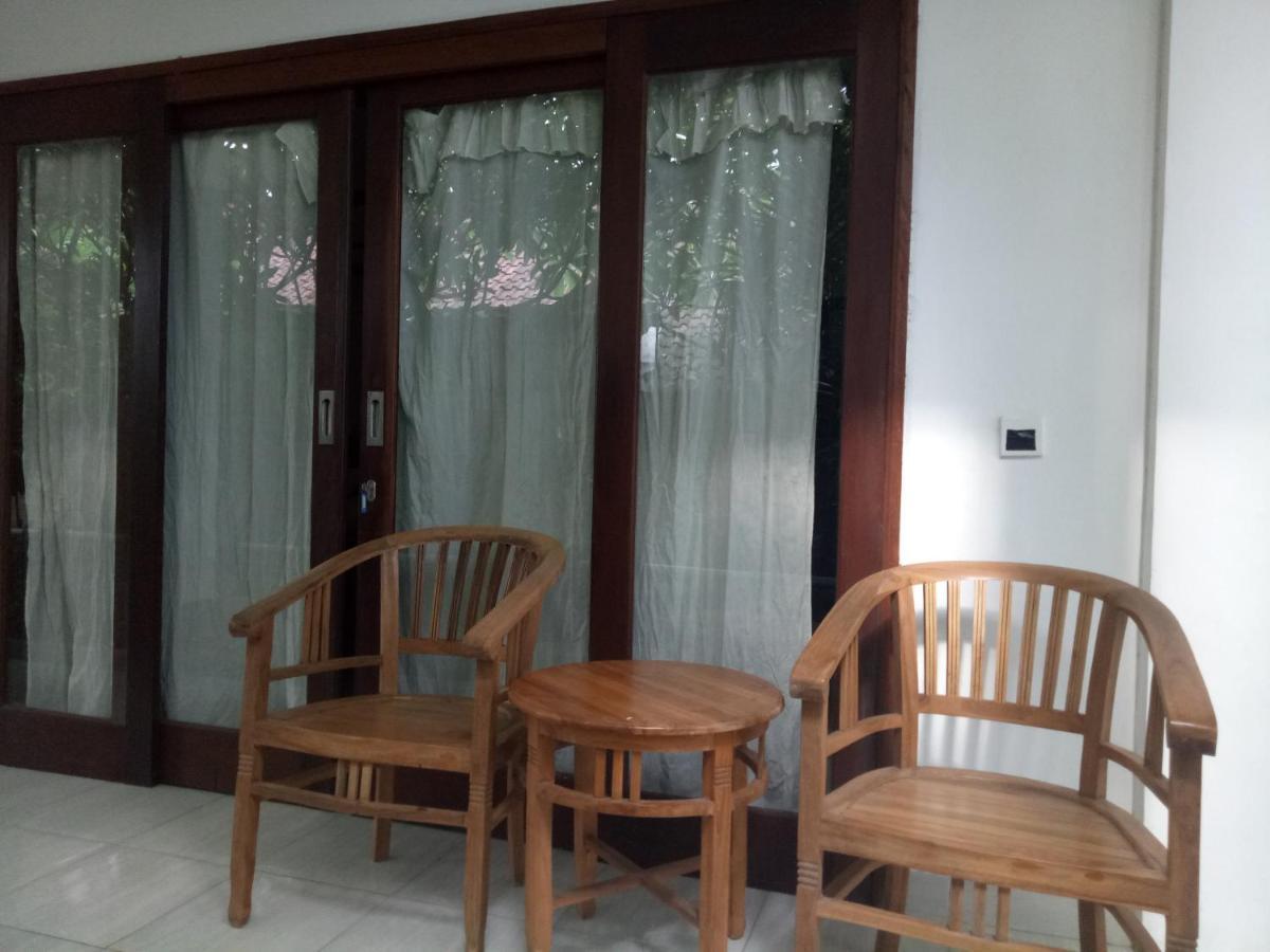 Amed Stop Inn Homestay, Rooftop Restaurant And Bar Екстериор снимка