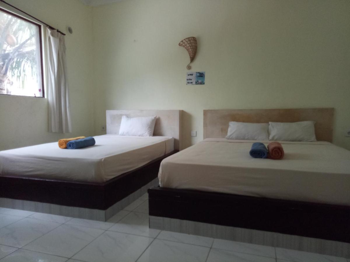 Amed Stop Inn Homestay, Rooftop Restaurant And Bar Екстериор снимка