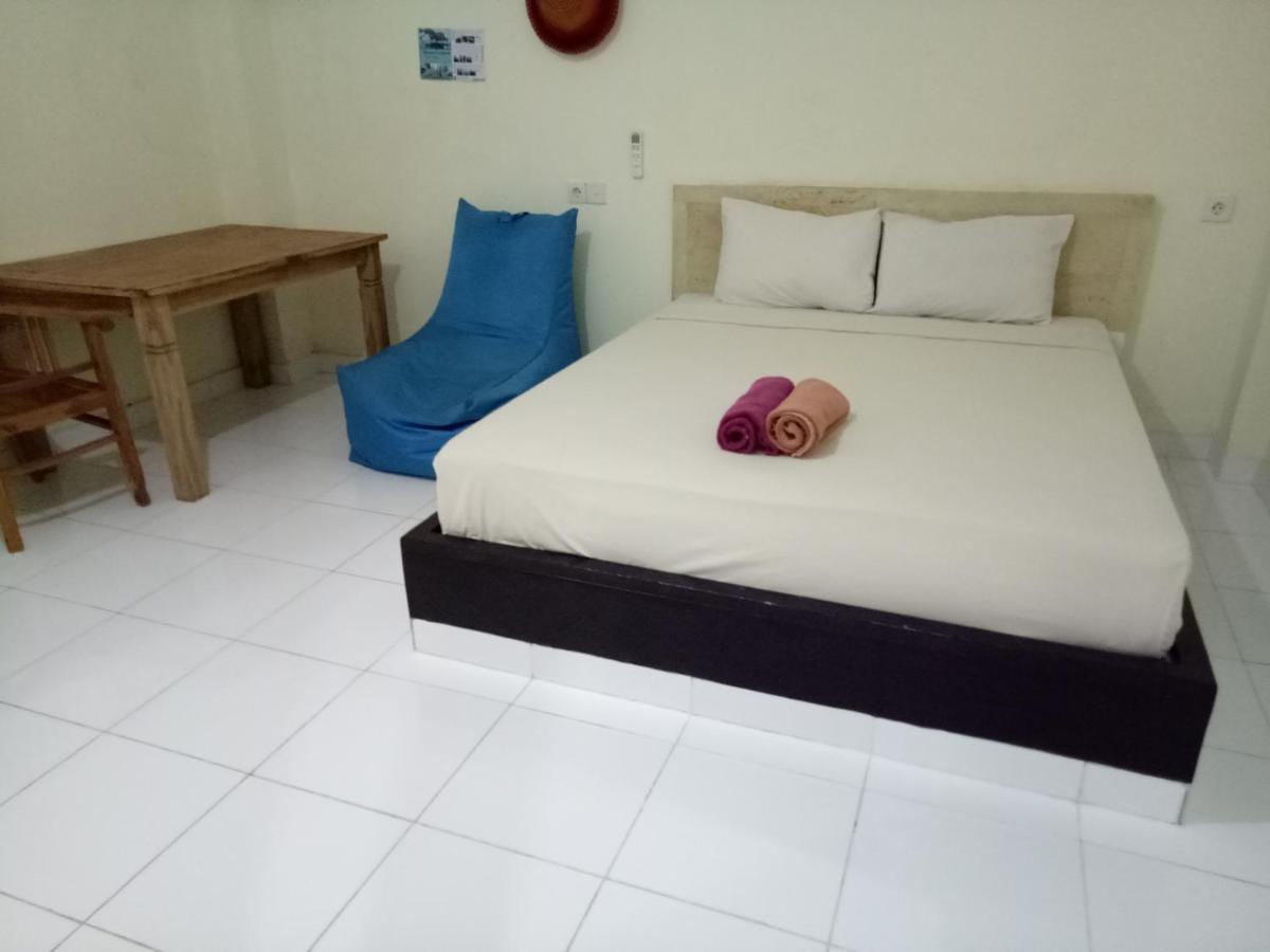 Amed Stop Inn Homestay, Rooftop Restaurant And Bar Екстериор снимка